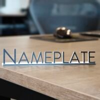 Sample office nameplate on a desk