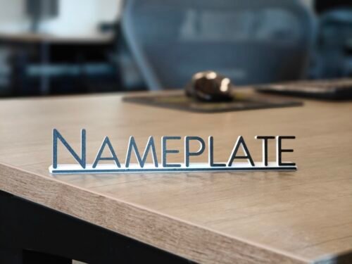 Sample office nameplate on a desk